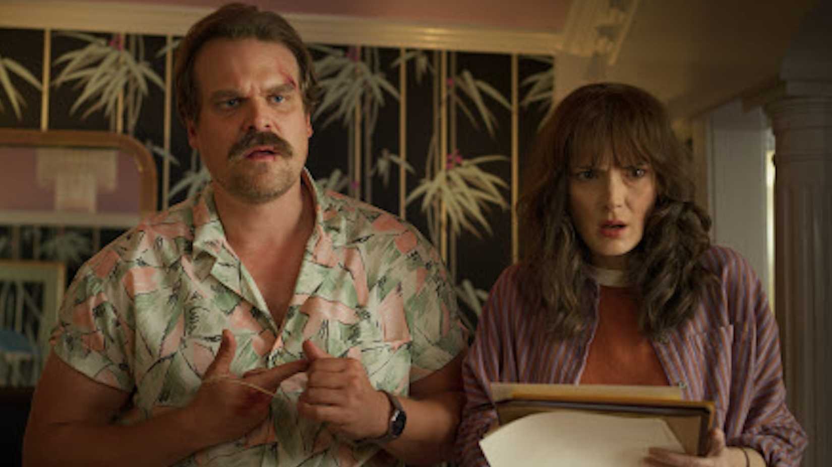 David Harbour's Hopper and Winona Ryder's Joyce look upset in Stranger Things