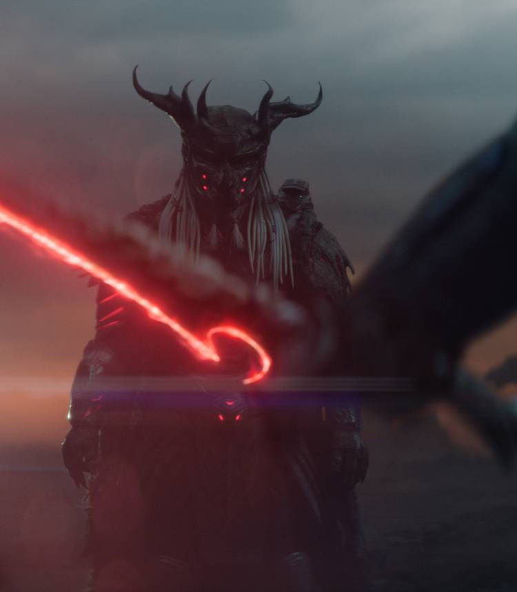 Njohrr observing with sword in Predator: Badlands