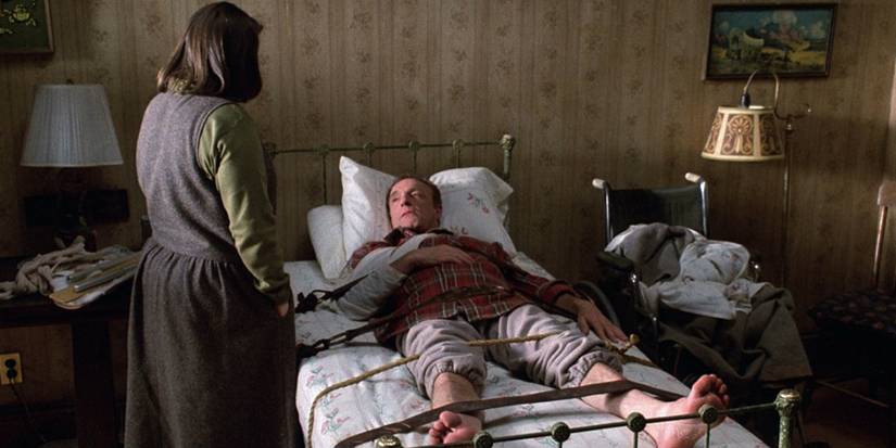 James Caan strapped to the bed in Misery
